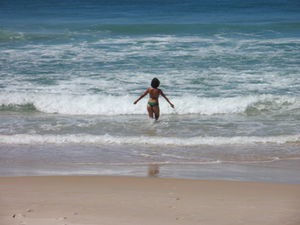 Beth in the sea at Praia da Joaquina.jpg