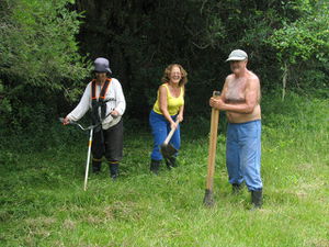 Beth planting with her parents.jpg