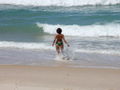 Beth in the sea at Praia da Joaquina 2.jpg