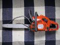 Chainsaw with chain off.jpg